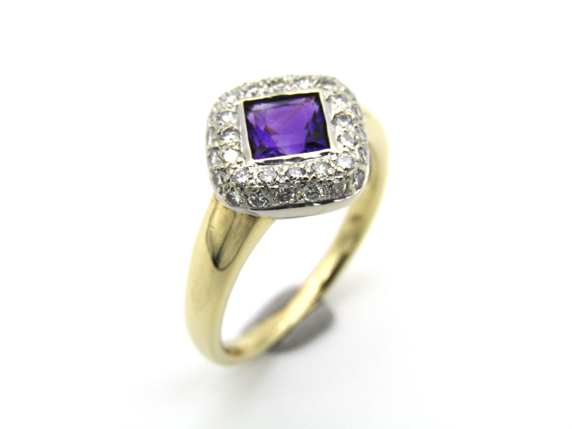 18K gold amethyst and diamond ring.