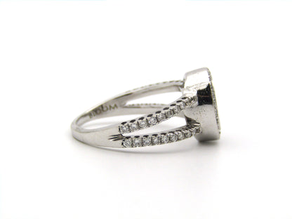 18K gold blue and colourless diamond ring.
