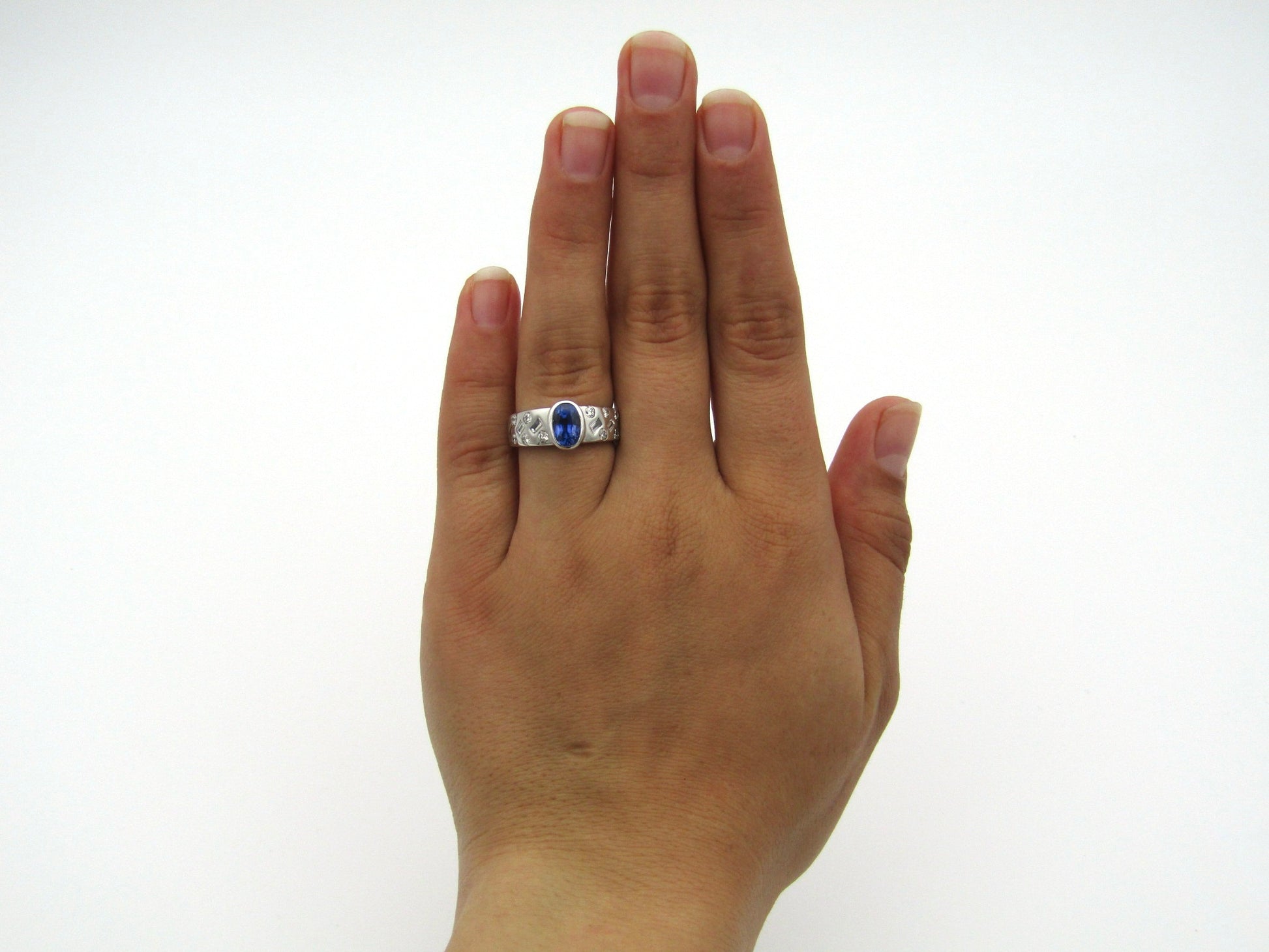 18K gold sapphire and diamond ring.