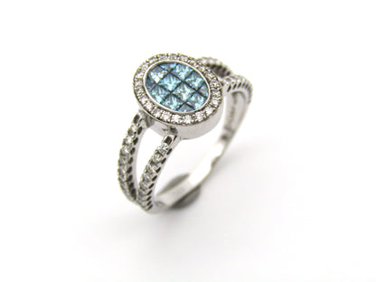 18K gold blue and colourless diamond ring.