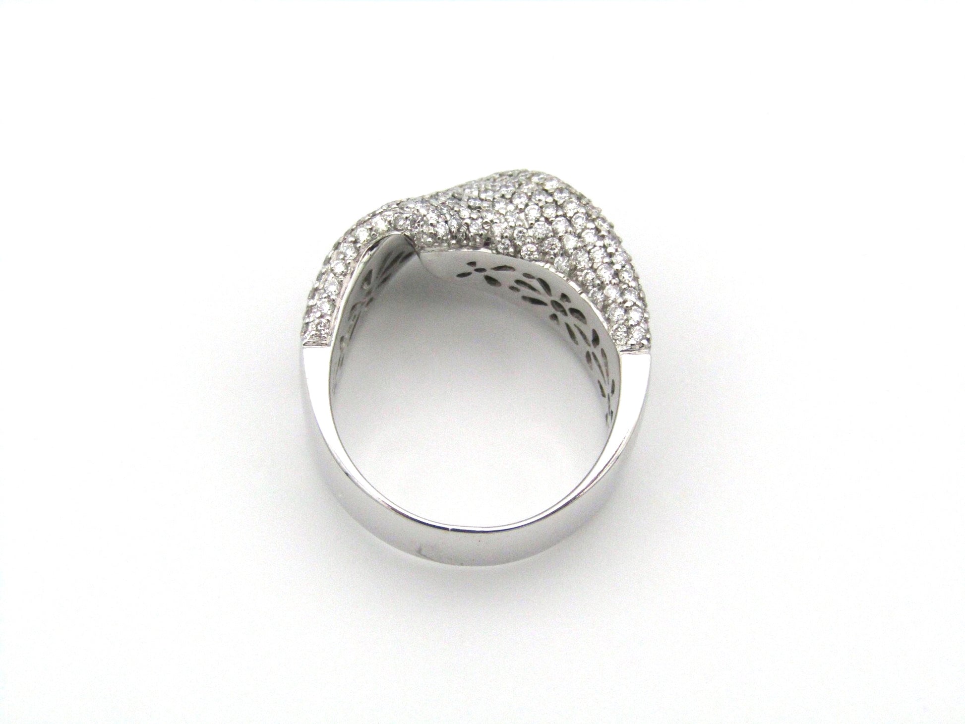 18K white gold diamond twist ring.