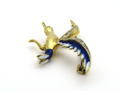 18kt gold diamond and enamel "Bird in flight" brooch.