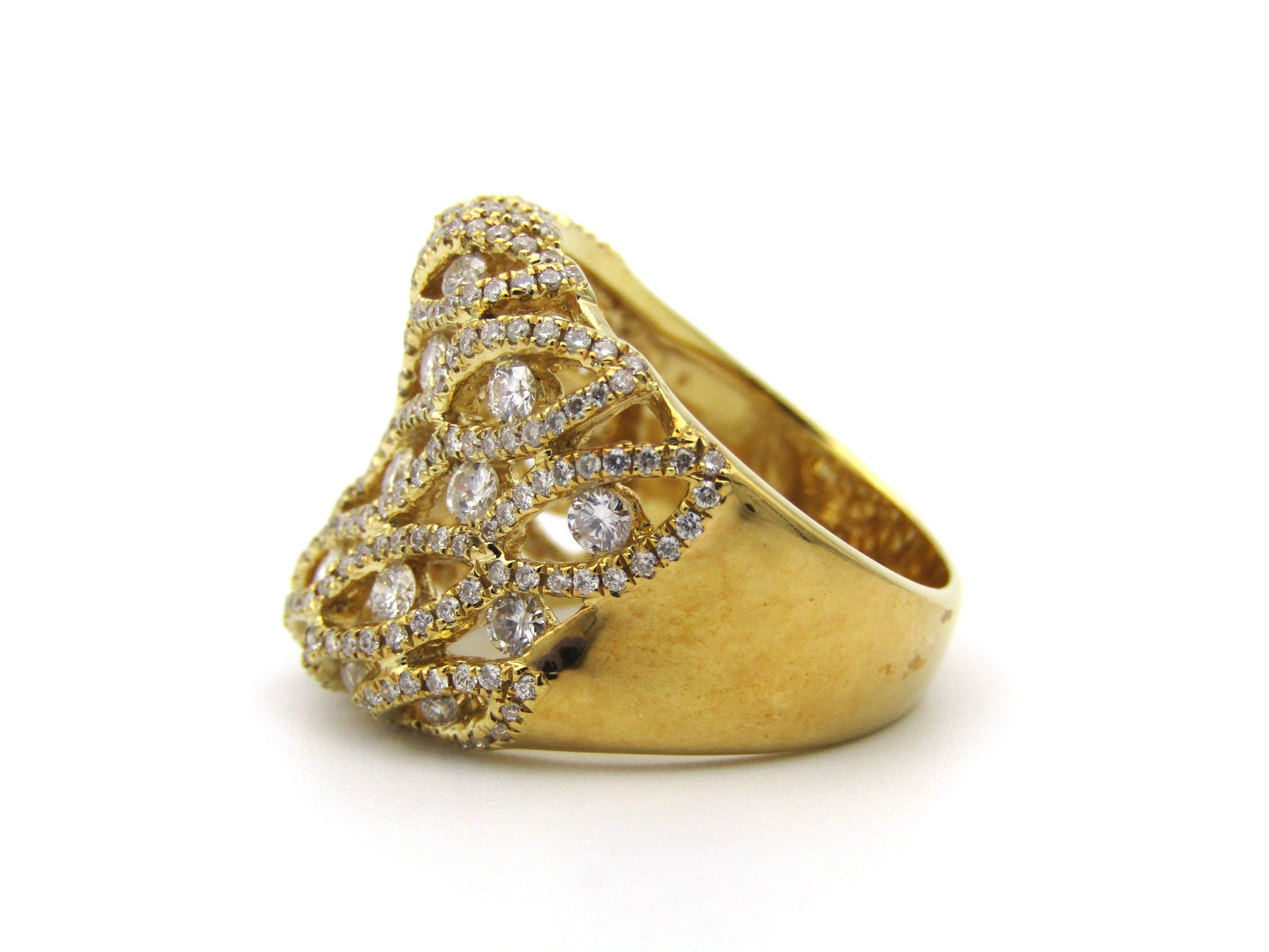 18K gold diamond dress ring.