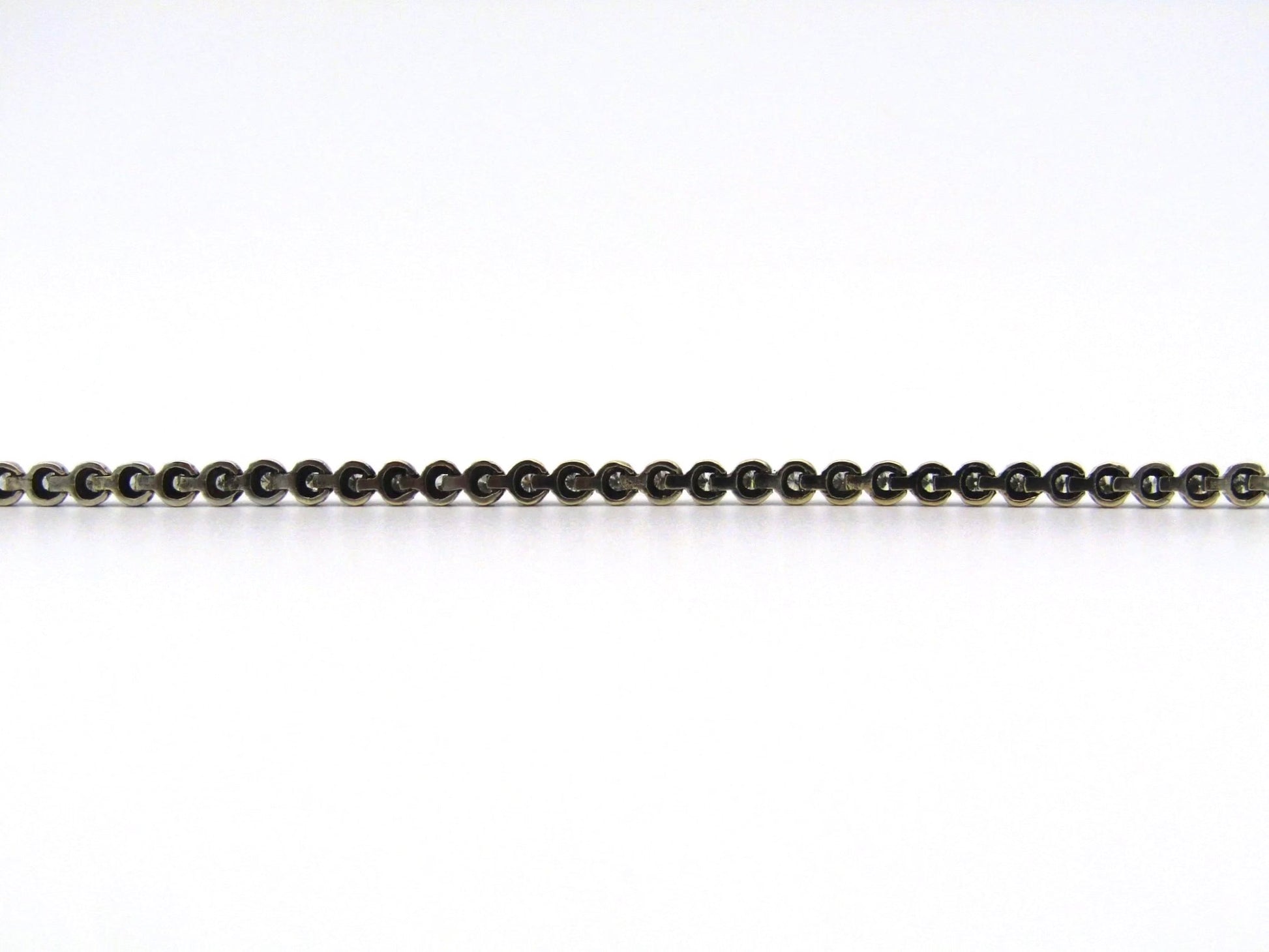 14K gold diamond tennis bracelet.