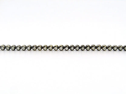 14K gold diamond tennis bracelet.